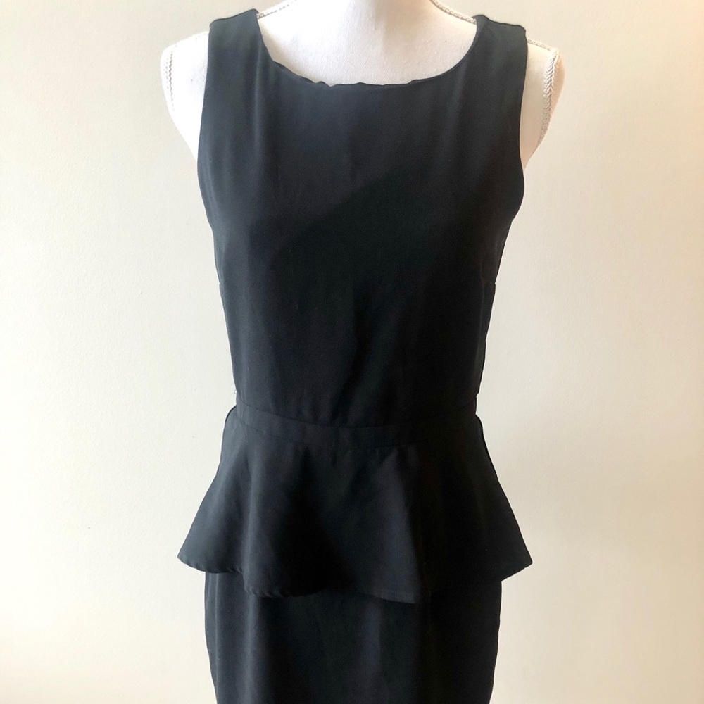 Black sleeveless peplum dress